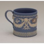 A late eighteenth century Wedgwood tri-colour jasper coffee cup, circa 1790. It is decorated in