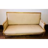 A Louis XVI revival giltwood carved and upholstered sofa, late 19th Century and later upholstered,