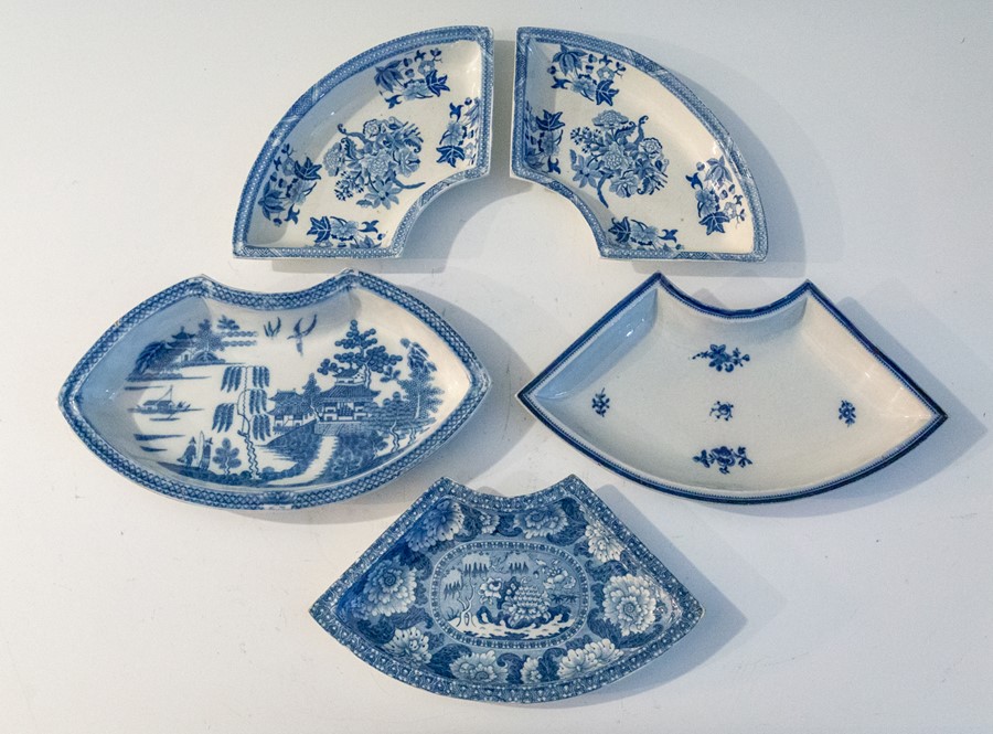 A collection of five early nineteenth century blue and white transfer printed supper set sections,