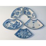 A collection of five early nineteenth century blue and white transfer printed supper set sections,