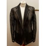 A black leather Mesh Loewe jacket with patch pockets 42 European size. A black fine Suede circa 1970