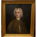 Circle of Enoch Seeman, mid 18th Century, portrait of a young gentleman, half length in a brown coat