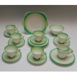 A Shelley Art Deco Eve tea service, concentric green circles design, No.411959, comprising cake