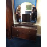 A George V oak part bedroom suite, comprising dressing chest with a mirrored back, 170cm high, 107cm