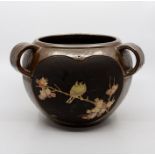 A Bretby art pottery bronzed triple-handled jardiniere with 'cloisonne' panels of birds on blossom