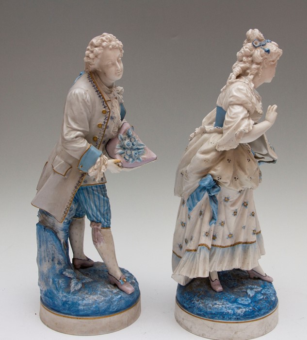 A pair of Continental figures, 19th Century, depicting and lady and gentleman, both holding head - Image 2 of 3