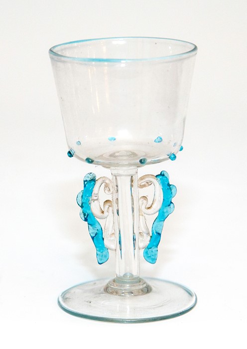 A facon de Venise wine glass with blue cane decoration, possibly Venice, circa 1700, height 10cm