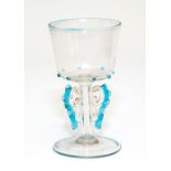 A facon de Venise wine glass with blue cane decoration, possibly Venice, circa 1700, height 10cm