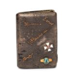 A Russian Moscow silver pocket cigarette case, textured exterior with applied names, enamel cross