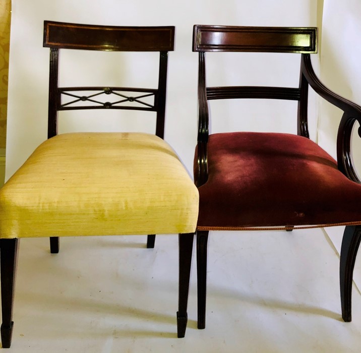 A 19th Century mahogany carver ; a similar dining chair (2)