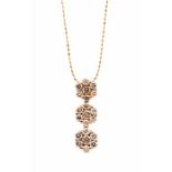 A champagne diamond and 9ct rose gold cluster necklace, comprising three hinged floral details