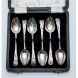 A set of six George III silver old English pattern teaspoons, bright cut engraved and monogrammed,