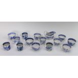 A large group of early nineteenth century blue and white transfer printed Broseley pattern tea