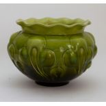 A Bretby Art Pottery green glaze jardiniere (1) Condition: In good overall condition.