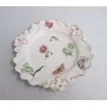 A Chelsea Silver Shaped Polychrome Plate painted with flower sprays and butterflies. Date: circa