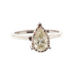 A pear cut diamond and 18ct white gold solitaire ring, the illusion set pear cut diamond weighing