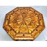 An 18th Century Dutch marquetry and walnut wine table, octagonal top inlaid with parquetry,