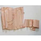 A 1940's lace corset, in Germaline pink!; a waist corset, circa 1930's; silk stockings by Masel (