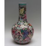 A 20th Century Chinese bottle vase, decorated in the famille rose palette with chrysanthemum and