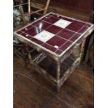 An Arts and Crafts bamboo square occasional table, tiled top, 75cm high, 68cm wide, 68cm deep