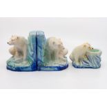 A pair of Bretby Art Pottery Art Deco polar bear bookends, No.3155, height 13cm, and a similar polar