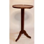 A George III oak wine table, circa 1780, moulded circular top supported on a turn column, raised