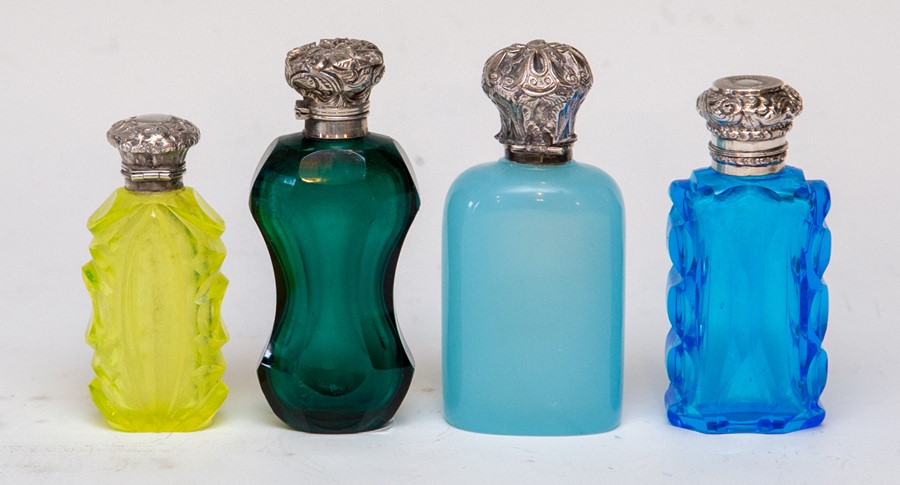 Four 19th Century coloured glass scent bottles, to include one uranium yellow, one opaque blue,