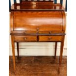 An Edwardian mahogany and satinwood banded cylinder bureau, circa 1910, scrolled gallery back on a
