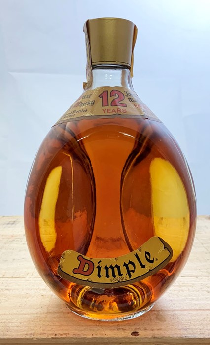A bottle of 12 year old Dimple.