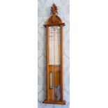A late 19th century Admiral Fitzroy's barometer, oak case of Gothic design, height 118cm