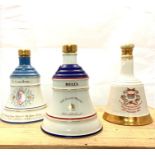 A selection of Bells Scotch Whisky decanters.