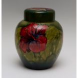 A Moorcroft hibiscus ginger jar and cover, impressed marks, green W.M initials, Queen Mary paper