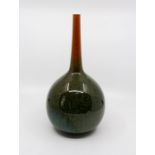 A Bretby art pottery mottled glaze bottle vase, No. 1720. 32 cm tall. (1) Condition: Opening with
