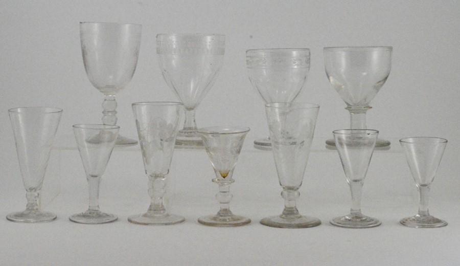 A collection of assorted late 18th Century and later drinking glasses, comprising three George III