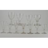 A collection of assorted late 18th Century and later drinking glasses, comprising three George III