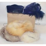 One box of hats to include: A blonde fox fur hat, a Mitzi Ginger Fox fur hat. A Della pillbox in a