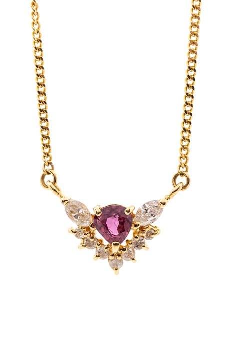 A ruby, diamond  and 18ct yellow gold cluster pendant, comprising a trillion cut ruby, approx 4.5mm,