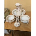 An early 20th century Arcadia ceramic washing set including 2 chamber pots, vase, bowl, jug and soap