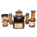 A group of Bretby art pottery carved bamboo wares to include: four vases (nos. 1859, 1855 and 1882),