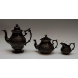 Three pieces of early nineteenth century Jackfield-type wares, circa 1810-30. To include: A low