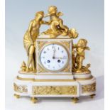 A 19th Century French marble and ormolu mounted eight day mantle clock, applied with a figure of a