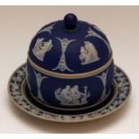 A mid-nineteenth century Wedgwood Jasper ware honeypot and cover, circa 1850. It is decorated in the