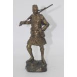 Georges Omerth (act.1895-1925), a bronze study of a WWI Scottish Soldier holding a rifle over his