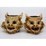 Two Bretby Art Pottery grotesque cat head night lights, with glass eyes, No.1258A, height 18cm (2)