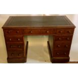 A Victorian oak pedestal desk,circa 1860, rectangular green inlay top with three frieze drawers,