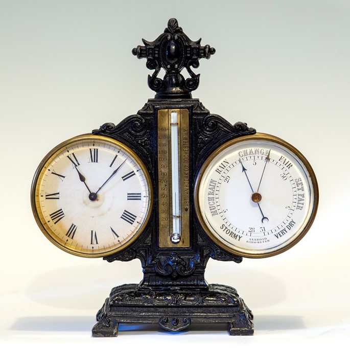 A late 19th Century Eastman Kodak desk clock and aneroid barometer combined, circa 1890, cast