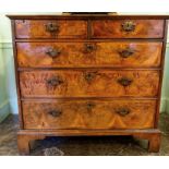 A George II figured walnut, double crossbanded and feather-banded chest of drawers, circa 1750,