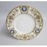 A Minton Very Fine Plate With Pate sur Pate classical heads set within raised gilt fan panels. Two