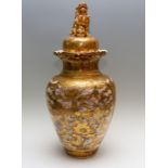 A large Japanese satsuma ware baluster vase and cover, Meiji period, 1868-1912, beast with a ball