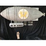 Zeppelin set with hanging Grandpa’s Shed in miniature.  approx. 4 ft long, display one side, flat on